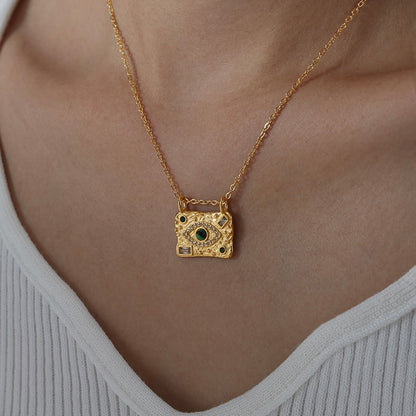 Green eye necklace