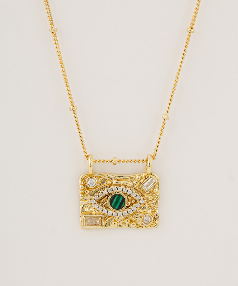 Green eye necklace
