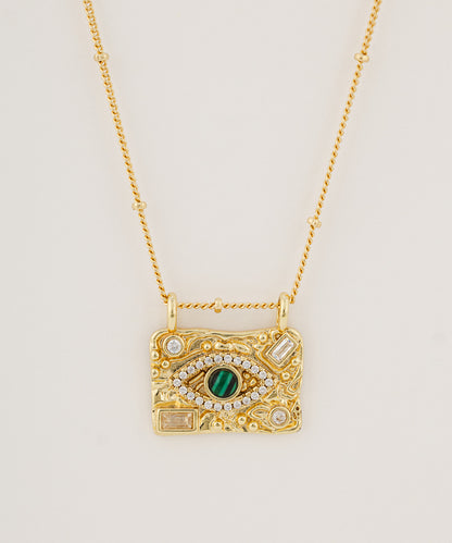 Green eye necklace